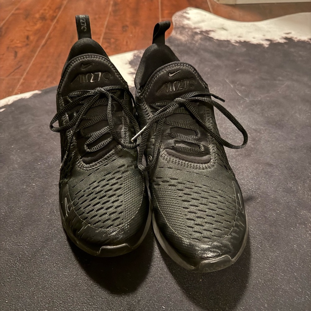 Nike Black Athletic Shoes with Textured Mesh Upper and Rubber Sole